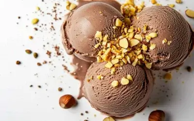 Chocolate and cardamom ice cream with golden hazelnut pieces